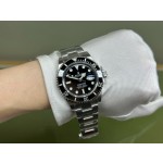 Rolex Submariner series, black dial, black bezel, 41mm, silver Oyster bracelet.