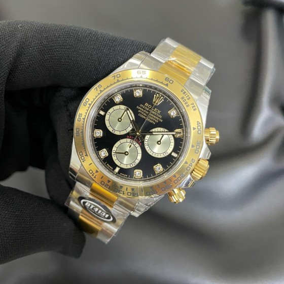 Rolex Daytona series, diamond-set black dial, gold bezel, silver case, 40mm, gold and silver Oyster bracelet.