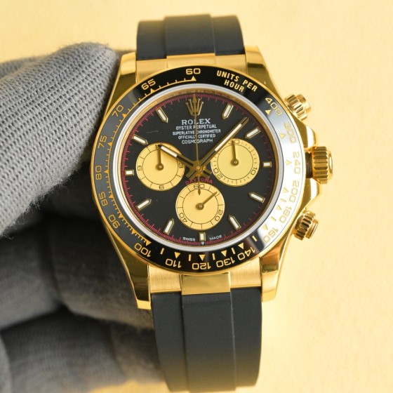 Rolex Daytona series, black dial, black bezel, gold case, 40mm, rubber strap.