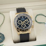 Rolex Daytona series, black dial, black bezel, gold case, 40mm, rubber strap.