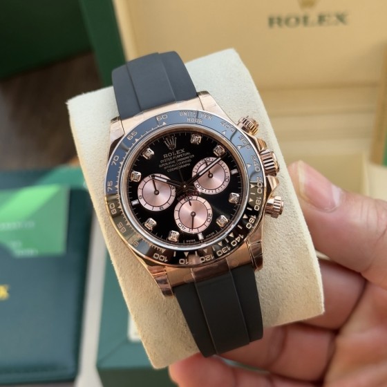 Rolex Daytona series with diamond-set black dial, black bezel, rose gold case, 40mm, rubber strap.