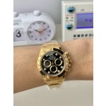 Rolex Daytona series, diamond-set black dial, gold bezel, gold case, 40mm, gold Oyster bracelet.