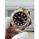 Rolex Yacht-Master series, brown dial, rose gold bezel, silver case, 40mm, two-tone Oyster bracelet.