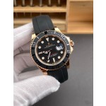 Rolex Yacht-Master series, black dial, black bezel, rose gold case, 40mm, rubber strap.