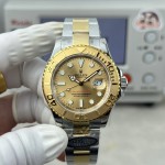 Rolex Yacht-Master series, gold dial, gold bezel, silver case, 40mm, two-tone Oyster bracelet.