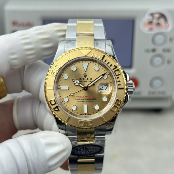 Rolex Yacht-Master series, gold dial, gold bezel, silver case, 40mm, two-tone Oyster bracelet.