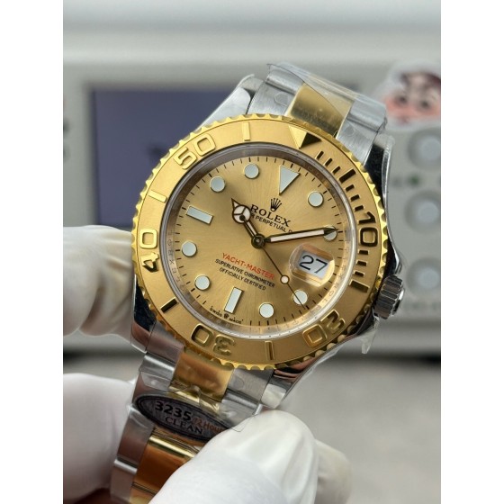 Rolex Yacht-Master series, gold dial, gold bezel, silver case, 40mm, two-tone Oyster bracelet.