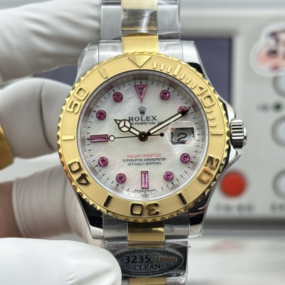 Rolex Yacht-Master series, with diamond-set mother-of-pearl dial, gold bezel, silver case, 40mm, two-tone Oyster bracelet.