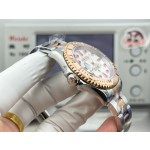 Rolex Yacht-Master series with diamond-set white dial, rose gold bezel, silver case, 40mm, two-tone Oyster bracelet.