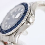 Rolex Yacht-Master series, black dial, blue bezel, silver case, 40mm, silver Oyster bracelet.