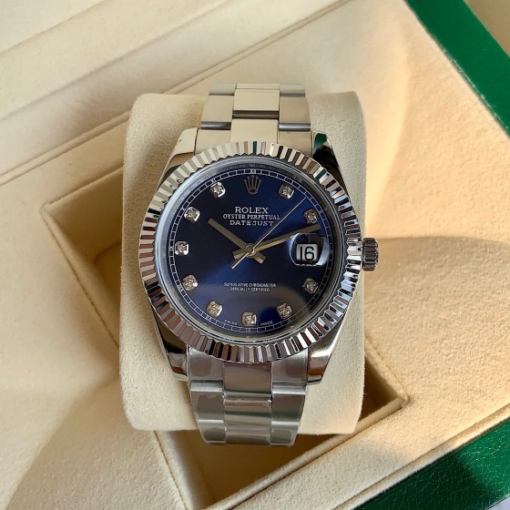 Datejust series men's and women's watches with diamonds, blue dial, silver bezel, 36mm and 41mm sizes, silver Oyster bracelet.