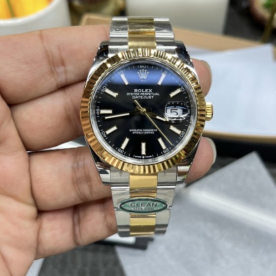 Datejust series men's watch, black dial, gold bezel, 41mm, two-tone Oyster bracelet.