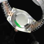 Log Series men's watch with diamonds, chocolate-colored dial, rose gold bezel, 41mm case, and two-tone five-link bracelet.