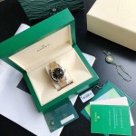 Datejust series men's watch, diamond-set black dial, gold bezel, 41mm, two-tone Oyster bracelet.