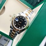 Datejust series men's watch, diamond-set black dial, gold bezel, 41mm, two-tone Oyster bracelet.
