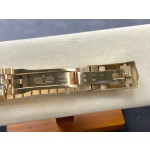 Navigator series men's watch, green dial, gold bezel, 42mm, gold five-link bracelet.