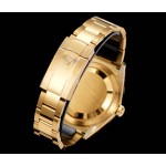 Navigator series men's watch, green dial, gold bezel, 42mm, gold Oyster bracelet.