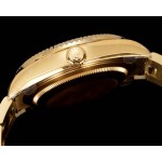 Navigator series men's watch, green dial, gold bezel, 42mm, gold Oyster bracelet.