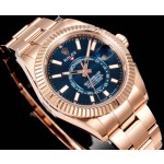 Navigator series men's watch, blue-green dial, rose gold bezel, 42mm, rose gold Oyster bracelet.
