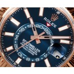 Navigator series men's watch, blue-green dial, rose gold bezel, 42mm, rose gold Oyster bracelet.