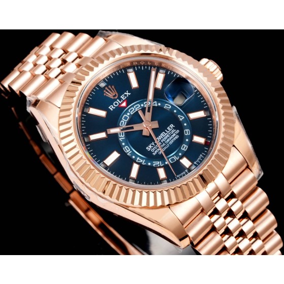 Navigator series men's watch, blue-green dial, rose gold bezel, 42mm, rose gold five-link bracelet.
