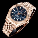 Navigator series men's watch, blue-green dial, rose gold bezel, 42mm, rose gold five-link bracelet.