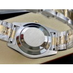 Navigator series men's watch, white dial, gold bezel, 42mm, two-tone Oyster bracelet.