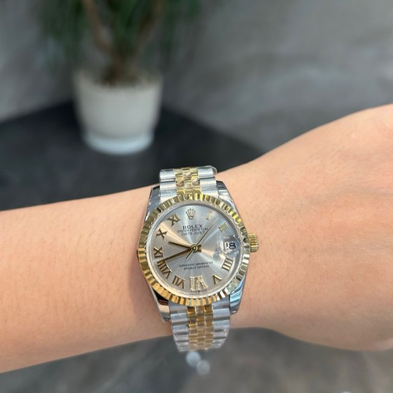 Datejust series, 31mm silver dial, two-tone gold and silver strap