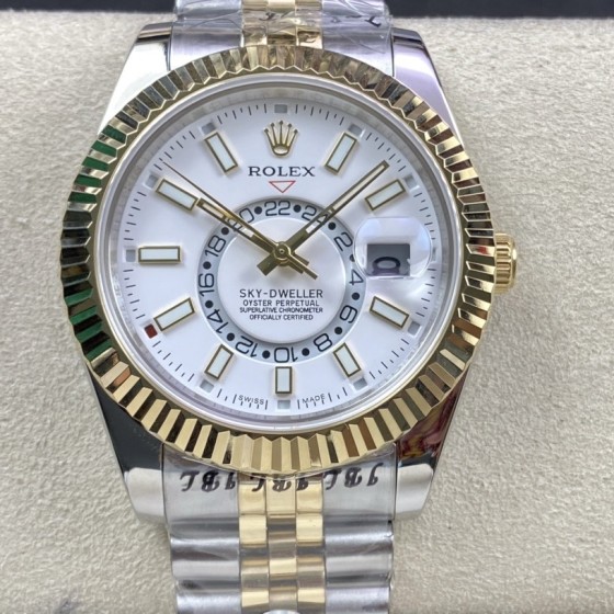 Navigator series men's watch, white dial, gold bezel, 42mm, two-tone five-link bracelet.
