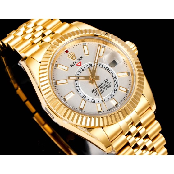 Navigator series men's watch, white dial, gold bezel, 42mm, gold five-link bracelet.