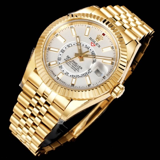 Navigator series men's watch, white dial, gold bezel, 42mm, gold five-link bracelet.