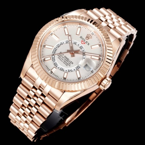 Navigator series men's watch, white dial, rose gold bezel, 42mm, rose gold five-link bracelet.