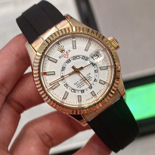 Navigator series men's watch, white dial, rose gold bezel, 42mm, rubber strap.