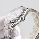 Navigator series men's watch, Roman numerals, white dial, silver bezel, 42mm, silver Oyster bracelet.