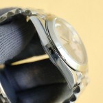 Sunday date display series men's watch, meteorite-colored dial, silver bezel, 40mm, silver President-style bracelet.