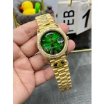 Sunday calendar series men's watch with gradient green dial, diamond-set bezel, and 40mm gold President-style bracelet.