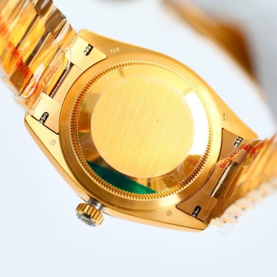 Sunday calendar series men's watch, bright black dial, gold bezel, 40mm, gold President-style bracelet.
