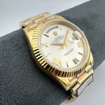 Sunday calendar series men's watch, silver dial, gold bezel, 40mm, gold President-style bracelet.