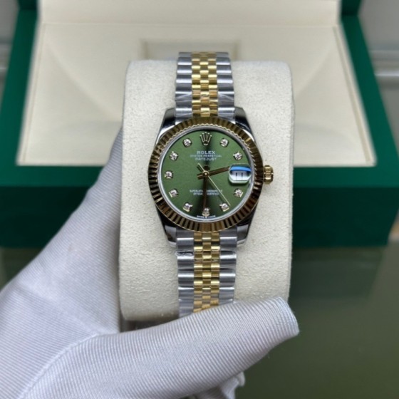 Datejust series, green dial, 31mm, gold and silver two-tone strap.