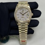 Sunday calendar series men's watch with full diamond dial, diamond-set bezel, and 41mm gold President-style bracelet.