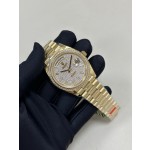 Sunday calendar series men's watch with full diamond dial, diamond-set bezel, and 41mm gold President-style bracelet.