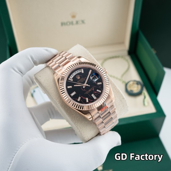 Sunday calendar series men's watch with hematite quartz dial, rose gold bezel, 40mm case, and rose gold President-style bracelet.