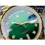 Sunday date display series women's watch with gradient green dial, gold bezel, 36mm case, and gold President-style bracelet.