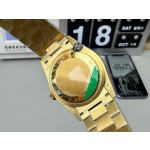 Sunday date display series women's watch with gradient green dial, gold bezel, 36mm case, and gold President-style bracelet.