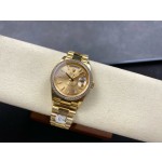 Sunday Calendar series men's and women's watches, gold dial, diamond-set bezel, 36mm and 40mm sizes, gold President-style bracelet.