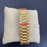 Sunday calendar series women's watch, mother-of-pearl dial, diamond-set bezel, 36mm, gold President-style bracelet.