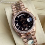 Sunday date display series women's watch with hematite-colored dial, diamond-set bezel, 36mm rose gold President-style bracelet.
