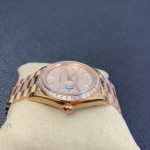 Sunday date display series women's watch, rose gold dial, diamond-set bezel, 36mm, rose gold President-style bracelet.
