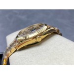 Sunday calendar series men's watch with full diamond dial, gold bezel, 40mm, gold President-style bracelet.