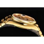 Sunday calendar series women's watch with diamond-set dial, gold bezel, 36mm case, and gold President-style bracelet.
